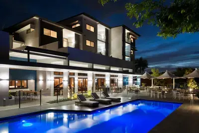 Robertson Park Retirement Village outdoor swimming pool and community centre at night